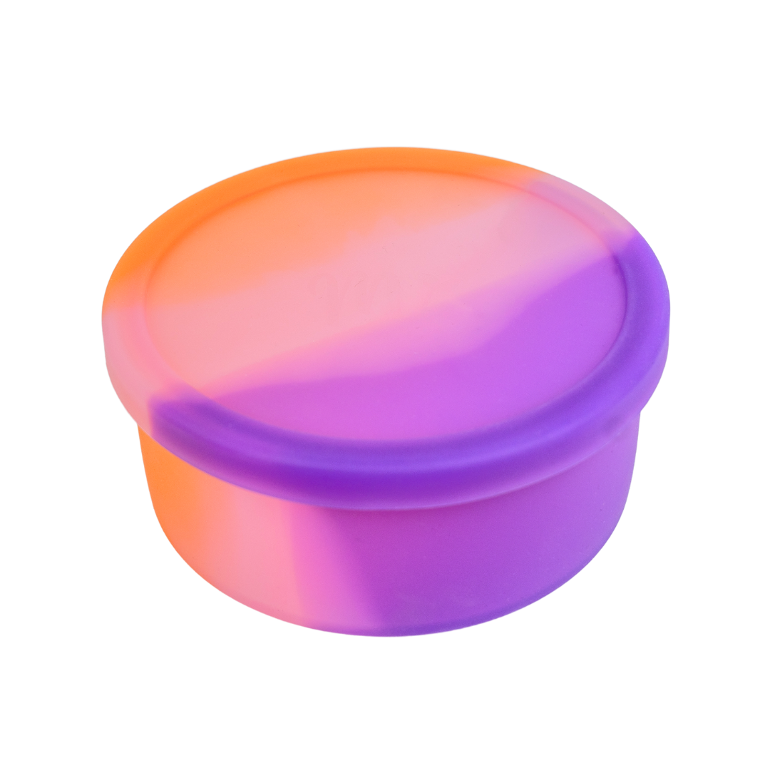 Vibrant sunset bento bowl with lid closed, featuring an orange and purple gradient.
